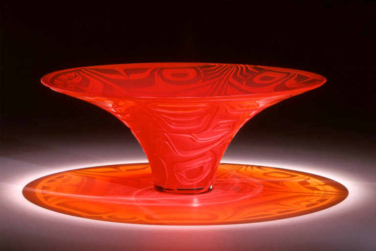 A glass crest hat with traditional tlingit motifs by Preston Singletary